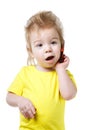 Funny kid talking on a cell phone Royalty Free Stock Photo