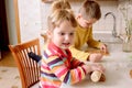 Funny kids bake cookies in kitchen. happy family Royalty Free Stock Photo