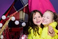 Funny kids face of two cute little children playing in tent at home. Funny lovely kids having fun. Pajamas for kids