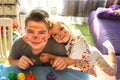 Funny kids with stained faces having fun at home in the kitchen. Brother and little sister. Funny. Creative concept. Mess at home Royalty Free Stock Photo