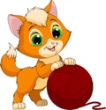 Funny kitten with a ball of threads Royalty Free Stock Photo