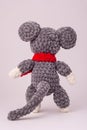 Funny knitted teddy mouse, Rear view, white background Royalty Free Stock Photo