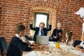 Funny leader dancing in the business meeting Royalty Free Stock Photo