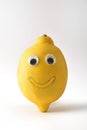 Funny lemon with face on white isolated background
