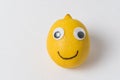 Funny lemon fruit character. Ripe lemon with eyes and smile. creative idea