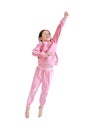 Funny little Asian child girl in pink tracksuit or sport cloth jumping on air over white background. Freedom kid movement concept Royalty Free Stock Photo
