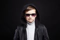 Funny little boy in hoodie and sunglasses Royalty Free Stock Photo