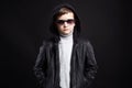 Funny little boy in hoodie and sunglasses Royalty Free Stock Photo