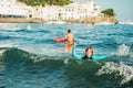 Funny little boy playing in the sea Royalty Free Stock Photo