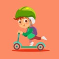 Funny little boy riding kid scooter. Royalty Free Stock Photo