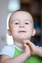 Funny little boy showing emotions, admiration. Caucasian child 2 years old. Closeup portriat.