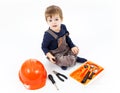 Funny little boy with tools kit on white background Royalty Free Stock Photo