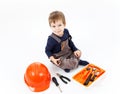 Funny little boy with tools kit on white background Royalty Free Stock Photo