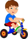 Funny little child on tricycle