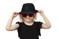 Funny little girl in a black hat Royalty Free Stock Photo