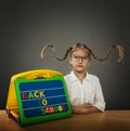 Funny little girl with braided hair up, big glasses