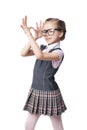 Funny little girl in glasses makes faces Royalty Free Stock Photo