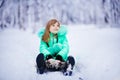 Funny little girl having fun in beautiful winter park Royalty Free Stock Photo