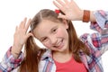 Funny little girl making faces Royalty Free Stock Photo