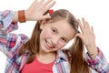 Funny little girl making faces Royalty Free Stock Photo