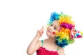 Funny little girl in multicolored wig