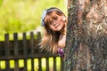 Funny little girl playing in the park