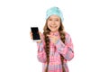 Funny little girl showing smart phone with blank screen on white background. Playing Games and watch video.