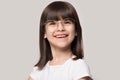 Funny little girl wearing glasses with round big spectacle frame Royalty Free Stock Photo