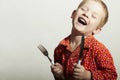 Funny Little Handsome Boy with Fork and Knife Royalty Free Stock Photo
