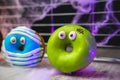 Funny little monster donut for halloween bright colors with little eyes Royalty Free Stock Photo