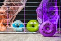 Funny little monster donut for halloween bright colors with little eyes Royalty Free Stock Photo