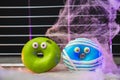 Funny little monster donut for halloween bright colors with little eyes Royalty Free Stock Photo