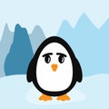 Funny little penguin on background of icy mountains. Royalty Free Stock Photo