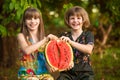 Funny little sisters girl eat watermelon in summer Royalty Free Stock Photo