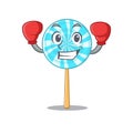 Funny lollipop in red boxing cartoon character