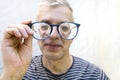 Funny looking nearsighted man Royalty Free Stock Photo