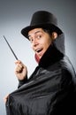 Funny magician man with wand