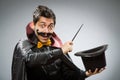 Funny magician man with wand Royalty Free Stock Photo