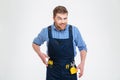 Funny male builder looking at camera Royalty Free Stock Photo