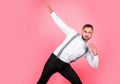 Funny male model with win gesture celebrate success. Portrait of funny funky crazy man, winner face expression. Royalty Free Stock Photo