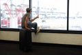 Funny man in airport with suitcase Royalty Free Stock Photo