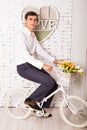 Funny man on bicycle indoors Royalty Free Stock Photo