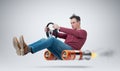 Funny man car driver with a wheel, concept of alternative transport Royalty Free Stock Photo