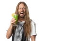 Funny man drinking green vegetable smoothie