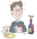 Funny man drinking wine at home