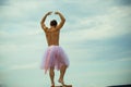 Funny man freak. Crazy ballerina. drag queen. Man in ballerina skirt outdoor. Man dancing in tutu in ballet studio