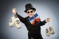 The funny man with money dollar sacks Royalty Free Stock Photo