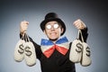 The funny man with money dollar sacks Royalty Free Stock Photo