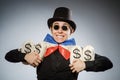 Funny man with money dollar sacks Royalty Free Stock Photo