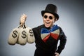 Funny man with money dollar sacks Royalty Free Stock Photo